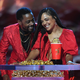 Lakeith Stanfield, left, and Tessa Thompson speak onstage during the 2018 MTV Movie And TV Awards on June 16, 2018 in Santa Monica, CA.